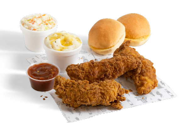 Three pieces of golden friend chicken strips and sides